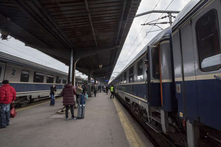 BUCHAREST, ROMANIA - FEBRUARY 15, 2020: Passengers unboarding an intercity train from CFR Calatori, the romanian railways company, in Gara de Nord, the main railway station of Bucharest.のeditorial素材