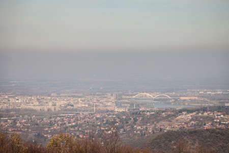 Aerial panoramal of Novi Sad, seen from a hill of Fruska Gora National park, with a focus on the...