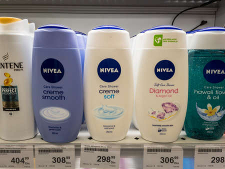 BELGRADE, SERBIA - SEPTEMBER 17, 2020: Nivea logo on some of their shampoo and shower gel bottles for sale. Nivea is a german brand of cosmetics, hygiene and personal care products.のeditorial素材