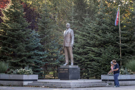 BELGRADE, SERBIA - OCTOBER 4, 2020: Statue of heydar Aliyev in a park of Belgrade. Heydar Aliyev is the third president of the independent Azerbaijan, known for its autocratic practices. Picture of the statue of heydar Aliyev in a park of Belgrade, Serbiaのeditorial素材
