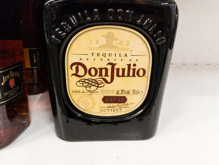 BELGRADE, SERBIA - NOVEMBER 1, 2020: Tequila Don Julio logo on one of their bottles. Don Julio is a mexican brand of tequila and other mexico alcohols part of the group Diageo.のeditorial素材
