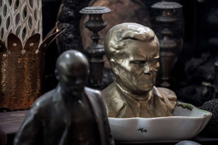 BELGRADE, SERBIA - OCTOBER 9, 2020: Bust of Marshal Josip broz Tito facing a small statue of Vladimir Lenin. Tito was the communist socialist leader of Yugoslavia.のeditorial素材