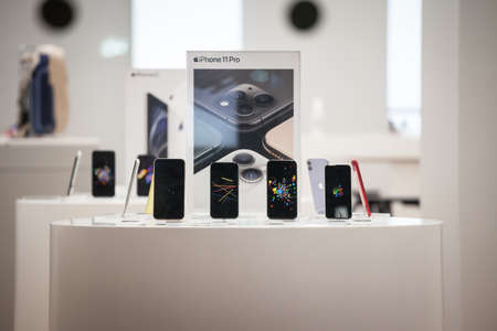 BELGARDE, SERBIA - SEPTEMBER 17, 2020: Several models of iPhone 11 Pro on display for sale in an Apple Store. iPhone 11 was Apple's smartphone for 2019.のeditorial素材