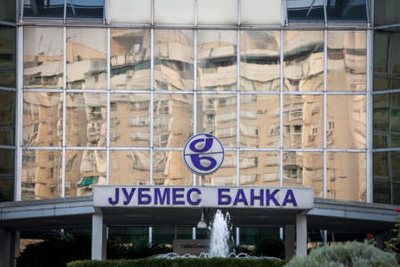 BELGRADE, SERBIA - AUGUST 21, 2018: Jubmes Banka logo on their main office. Jubmes banka was a Serbian bank, providing commercial and investment banking, now owned by Alta Pay.のeditorial素材