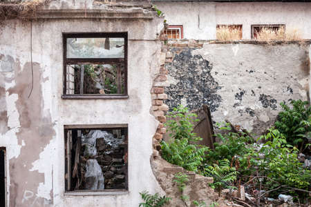 Outdoor facade of the ruins of a demolished residential building decaying in an urban environment in Belgrade, Serbia,の写真素材