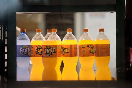BELGRADE, SERBIA - JUNE 6, 2019: Logo of Fanta on bottles of Orange and Shokata (blue) for sale in...