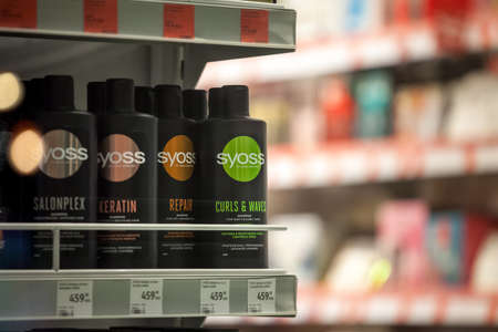 BELGRADE, SERBIA - DECEMBER 21, 2020: Syoss products, hair repair spray and shampoo conditioner for...