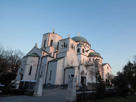 BELGRADE, SERBIA - FEBRUARY 17, 2019: Saint Sava Cathedral Temple (Hram Svetog Save) with the mala crkva svetog save in front. This orthodox church is one of the main monuments of Belgrade. Picture of the belgrade Cathdral Temple of Saint Sava, seen from のeditorial素材
