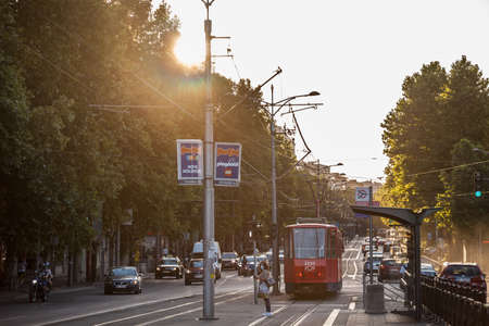 BELGRADE, SERBIA - JULY 13, 2020: belgrade tram, a tatra KT4, in the middle of a traffic jam on Bulevar kralja Aleksandra street. Also called beogradski tramvaji, it's a transportation system.のeditorial素材