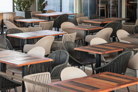 Selective blur on Empty terrace and patio of a bar restaurant of Belgrade, Serbia, closed with...