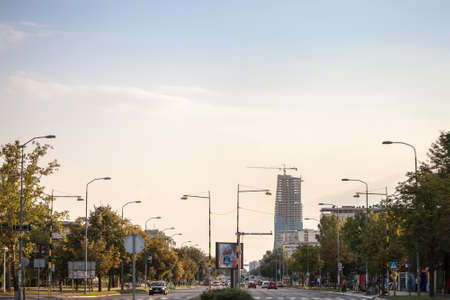BELGRADE, SERBIA - AUGUST 23, 2020: Omladinskih brigada street in Novi Beograd, with the West 65 skyscraper tower under construction in background. New Belgrade is the business district of the city.のeditorial素材