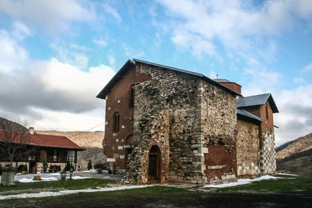 Main church and chapel of the manastir Banjska decani monastery in Zvecan, Kosovo. It is one of the main serbian orthodox monasteries in Kosovo and a major dispute between serbs and albanians.の写真素材