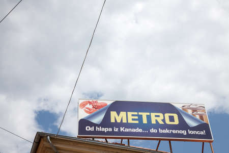 OSIJEK, CROATIA - MAY 12, 2018: Metro Cash & Carry logo on their main supermarket store Osijek. Part of Metro AG, it is a chain of supermarkets specialized in B2B wholesale.のeditorial素材
