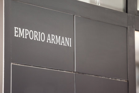 BELGRADE, SERBIA - MAY 3, 2021: Selective blur on an Emporio Armani logo on their main retailer in Belgrade Serbia. Emporio Armani is one of the fashion brands of the italian designer Giorgio armani.のeditorial素材