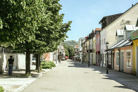 CETINJE, MONTENEGRO - JUNE 10, 2008: Njegoseva ulica street, empty and deserted, in summer. Njegoseva is the main pedestrian street of the montenegrian city of Cetinje.のeditorial素材