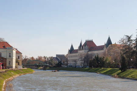 Zrenjaning court house, the palace of justice, or Palata pravde, an Austro hungarian buildings in the center of Zrenjanin, next to the Bega Begej river. Zrenjanin is a major city of the Serbian Voivodina province. Picture of the Bega river passing in the のeditorial素材