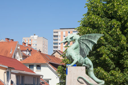 Dragon statue on zmajski most, or zmajev most (Dragon bridge) in Ljubljana, capital city of Slovenia. The dragon is considered to be the symbol of the city, protecting it.の写真素材