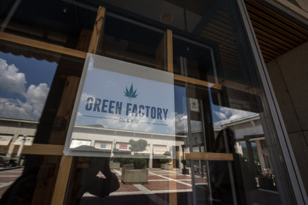 LJUBLJANA, SLOVENIA - JUNE 13, 2021: CBD store in the center of Ljubljana selling CBD cannabis and marijuana derivated products. Cannabis & weed are illegal but decriminalized in Slovenia.のeditorial素材