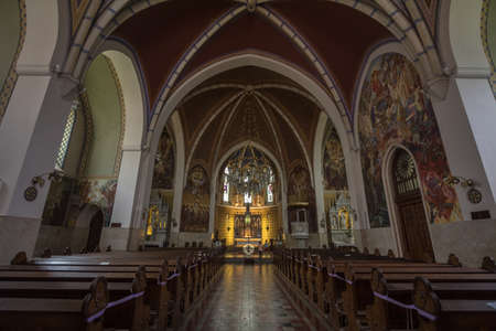 BLED, SLOVENIA - JUNE 12, 2021: interior of the Saint Martin church, or Cerkev Svetog Martina with its altars and benches. it's a catholic church and monument of Slovenia.のeditorial素材