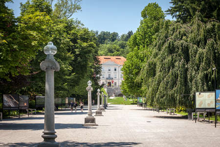 LJUBLJANA, SLOVENIA - JUNE 17, 2021: Tivoli park with a focus on its main alley, Jakopicevo sprehajalisce, or Jakopic Promenade. Tivoli park is the main city garden of the slovenian capital city.のeditorial素材