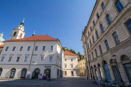 LJUBLJANA, SLOVENIA - JUNE 16, 2021: Pogarcjev trg square in the old town of ljubljana, in the pedestrian area of the capital city, with its typical austro hungarian architecture.のeditorial素材
