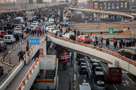 BELGRADE, SERBIA - DECEMBER 4, 2021: crowd of protestors blocking Most gazela bridge against vucic and serbian government demonstrating against rio tinto lithium mines and pollution in Serbia.のeditorial素材