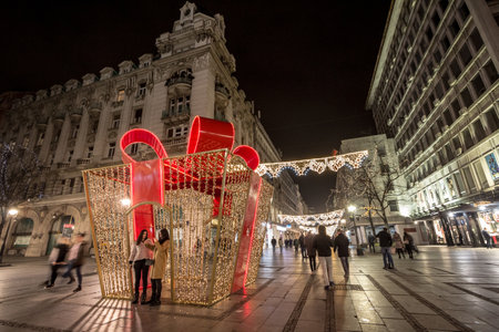 BELGRADE, SERBIA - NOVEMBER 19, 2017: Giant gift wrap used as the main Christmas decoration on Kneza Mihailova, main street of Belgrade, illuminated for Xmas and the new year.のeditorial素材