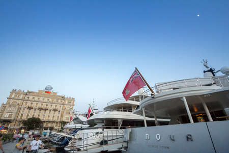 RIJEKA, CROATIA - JUNE 18, 2021: Yacht bearing the colors of Cayman islands, a flag of convenience, registered in george town, anchored on the waterfront of Rijeka, on the Adriatic coast.のeditorial素材