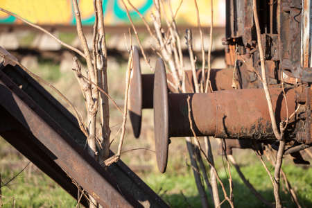 Selective blur on old vintage train buffers, on a railroad wagon, abandoned and neglected, whichis used to protect the carriage from bumps.の写真素材