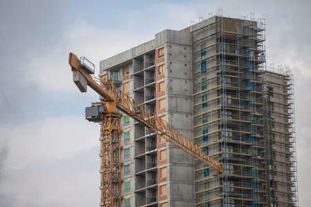Construction site in Serbia of a residential building, high rise skyscraper tower, with...