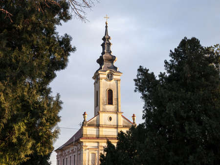 Picture of the tower of the Serbian church, in Banatsko Novo Selo, Serbia indicating the time. Banatsko Novo Selo is a town located in the South Banat District of the autonomous province of Vojvodina, Serbia.の写真素材