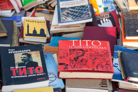 BELGRADE, SERBIA - SEPTEMBER 26, 2020: Second hand books of Marshal Josip broz Tito for sale on a flea market of Belgrade. Tito was the communist socialist leader of Yugoslavia.のeditorial素材