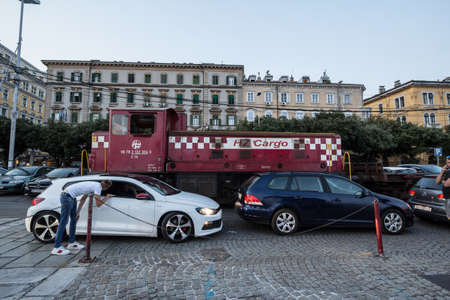 RIJEKA, CROATIA - JUNE 18, 2021: Switcher, a diesel locomotive, maneuvering a freight train from HZ...