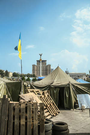 KYIV, UKRAINE - AUGUST 8, 2014: Euromaidan revolutions barricade in front of Hotel ukrayina and...