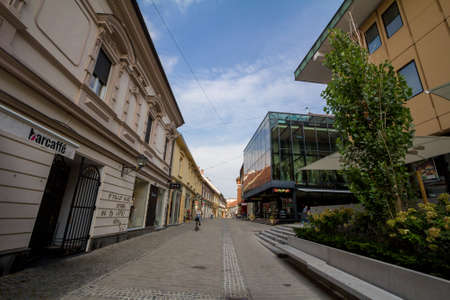 MARIBOR, SLOVENIA - SEPTEMBER 16, 2021: Gosposka Ulica street with people passing by boutiques and...