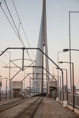 BELGRADE, SERBIA - OCTOBER 31, 2021: Tram stop of belgrade tram on the Ada bridge, or ada most, one of the most recent bridges on the Sava river and a transportation link in Balkans.のeditorial素材