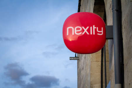 BORDEAUX, FRANCE - FEBRUARY 23, 2022: Nexity logo on their office for Bordeaux. Nexity is a french...