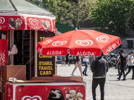 ISTANBUL, TURKEY - MAY 21, 2022: Selective blur on an algida logo on an umbrella of a reseller in istanbul. Algida is an italian ice cream producer and reseller, part of unilever.のeditorial素材