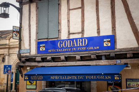 BERGERAC, FRANCE - FEBRUARY 21, 2022: Sign of the shop Godard, in Bergerac, specialized in Foie gras from Perigord, one of the symbols of the French gastronomy of southwestern France.のeditorial素材
