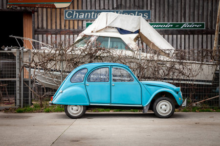 BORDEAUX, FRANCE - FEBRUARY 20, 2022: Blue Citroen 2CV parked in Bordeaux. The 2CV, or Deux Chevaux,...