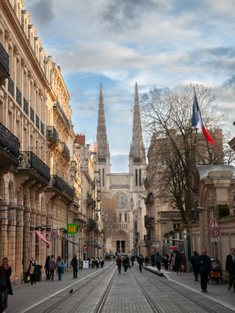 BORDEAUX, FRANCE - FEBRUARY 19, 2022: Bordeaux Cathedral (Cathedrale Saint Andre) seen from Vital carles street, in the historic part of the city. The cathedral is a symbol of the cityのeditorial素材