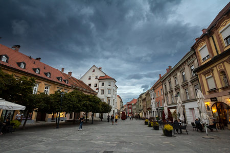 CELJE, SLOVENIA - SEPTEMBER 16, 2021: Panorama of the glani trg, the main square of the city center of Celje, Styria, Slovenia, with the a pedestrian street and shops in front.のeditorial素材