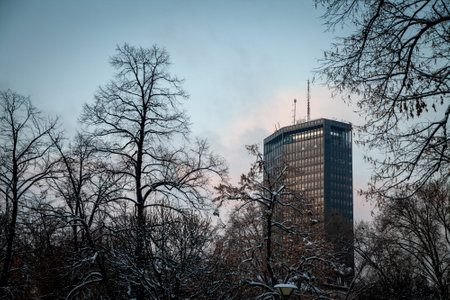 BELGRADE, SERBIA - JANUARY 22, 2022: Skyline of Belgrade with Beogradjanka tower in snow in winter, also called Palata Beograd, or Belgrade palace. Beogradanka is a major landmark of the capital city of Serbia.のeditorial素材