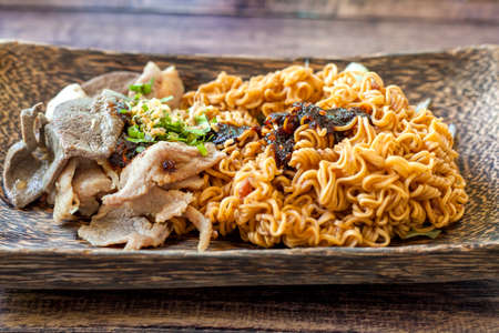 noodles spicy with vegetables and meat, Thai food.の写真素材