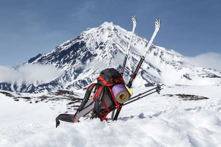 Equipment in the snow on background volcano on Kamchatka Peninsula on a sunny day. Russia Far East.の写真素材
