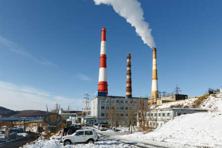 PETROPAVLOVSK-KAMCHATSKY, KAMCHATKA, RUSSIA - NOVEMBER 15, 2014: View on Kamchatka thermoelectric power station with smoking pipes. Kamchatka CHP-1, JSC Kamchatskenergo, RAO Energy System of East.のeditorial素材