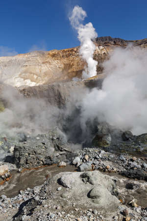 Volcanic landscape of Kamchatka: brimstone and fumarole field in crater of active Mutnovsky Volcano. Russia, Far East, Kamchatka Peninsula.の写真素材