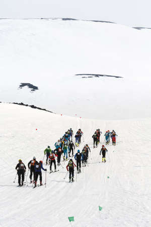 AVACHA, KORYAK VOLCANOES, KAMCHATKA, RUSSIA - APRIL 27, 2014: Group ski mountaineers climb on skis...