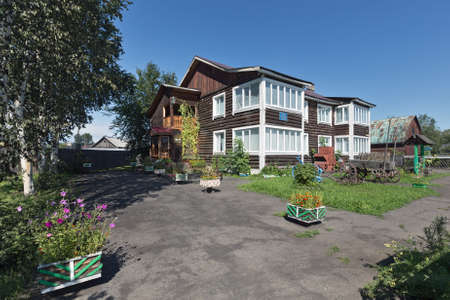 MILKOVO, KAMCHATKA, RUSSIA - AUGUST 13, 2014: View of the old wooden building of the Kamchatka state unified museum, Milkovo department on a sunny, cloudless day with blue skies.のeditorial素材