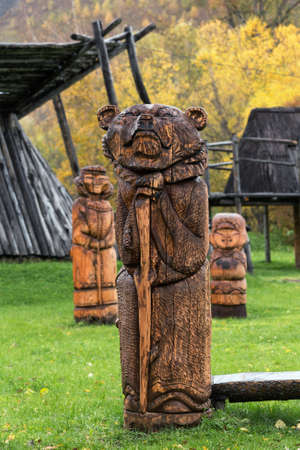 ESSO VILLAGE, KAMCHATKA PENINSULA, RUSSIA - SEP 18, 2013: Traditional wood carving - wooden sculpture of Kamchatka brown bear. Bystrinsky Ethnographic Museum in Bystrinsky Region on Kamchatka Region.のeditorial素材